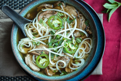 Vietnamese beef Pho soup with jalapeno mint and bean sprouts